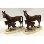 A pair of ceramic horse and foal figurines with marks to bases each measuring 19cm tall.