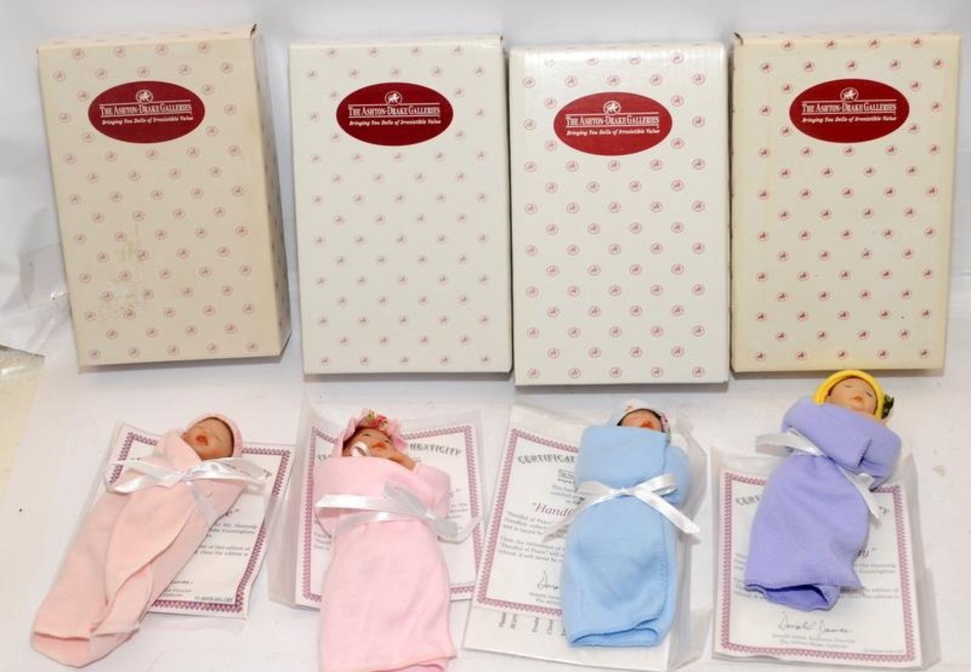 4 x Ashton Drake miniature Newborn vinyl dolls, Handful of Beauty, Handful of Peace, Handful of