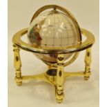 Contemporary gem set revolving globe of the world 24cm tall.