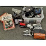 Box containing a large collection of miscellaneous cameras and camcorders.