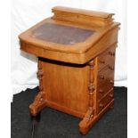 Reproduction Davenport desk with two hinged compartments and four drawers. 78cms tall x 52cms wide x