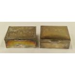 Two silver hallmarked wood lined cigarette boxes London 1927 and Birmingham 1910.