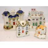 Antique Staffordshire flatback buildings to include castle spill vase and money box. Largest is