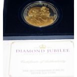 2012 Diamond Jubilee 5oz sterling silver coin with applied gold accents. In presentation case with