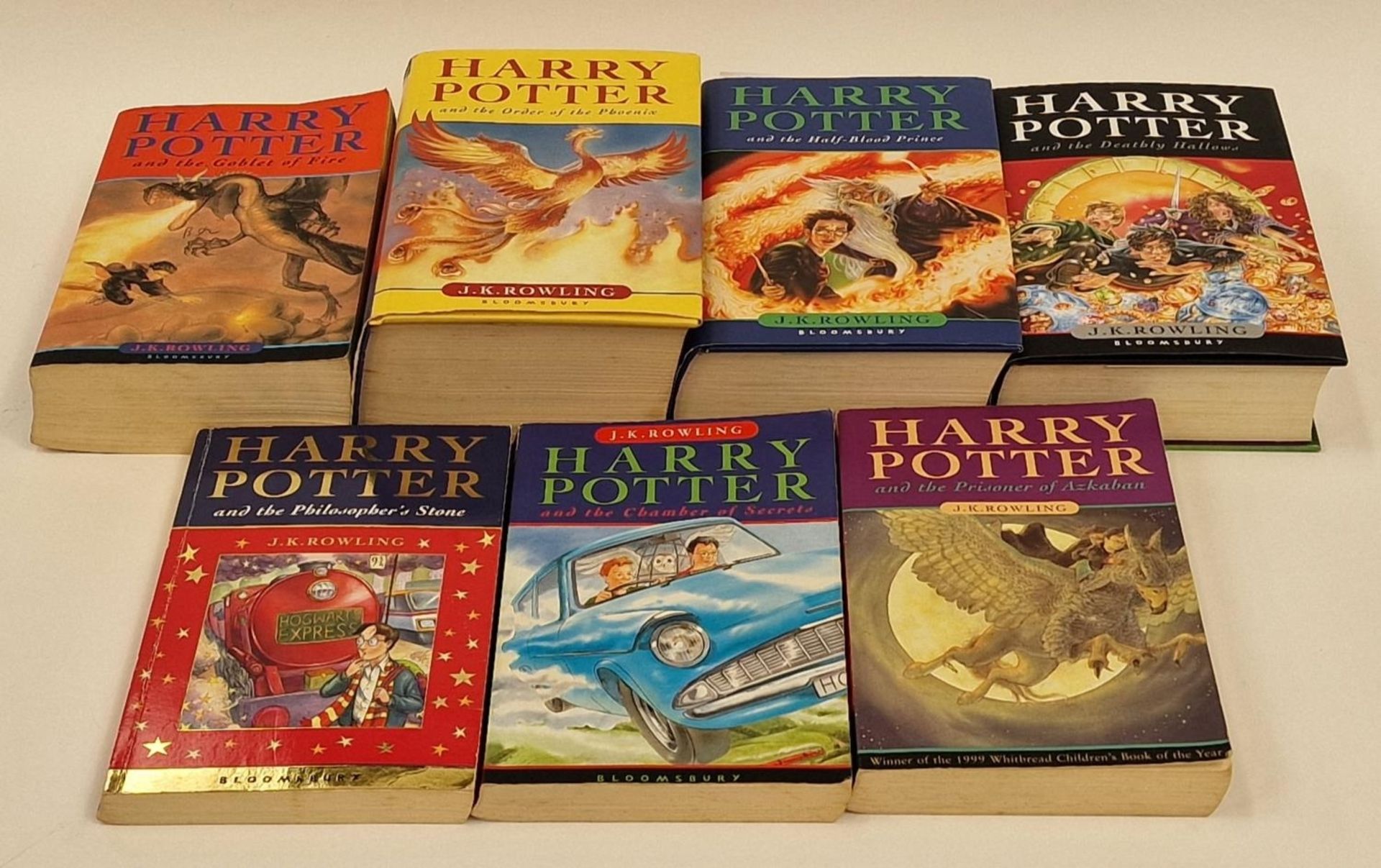 Complete set of J.K. Rowling Harry Potter books volumes 1-7. Three most recent books are first