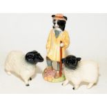 Beswick dog in the form of a Shepherd and two sheep