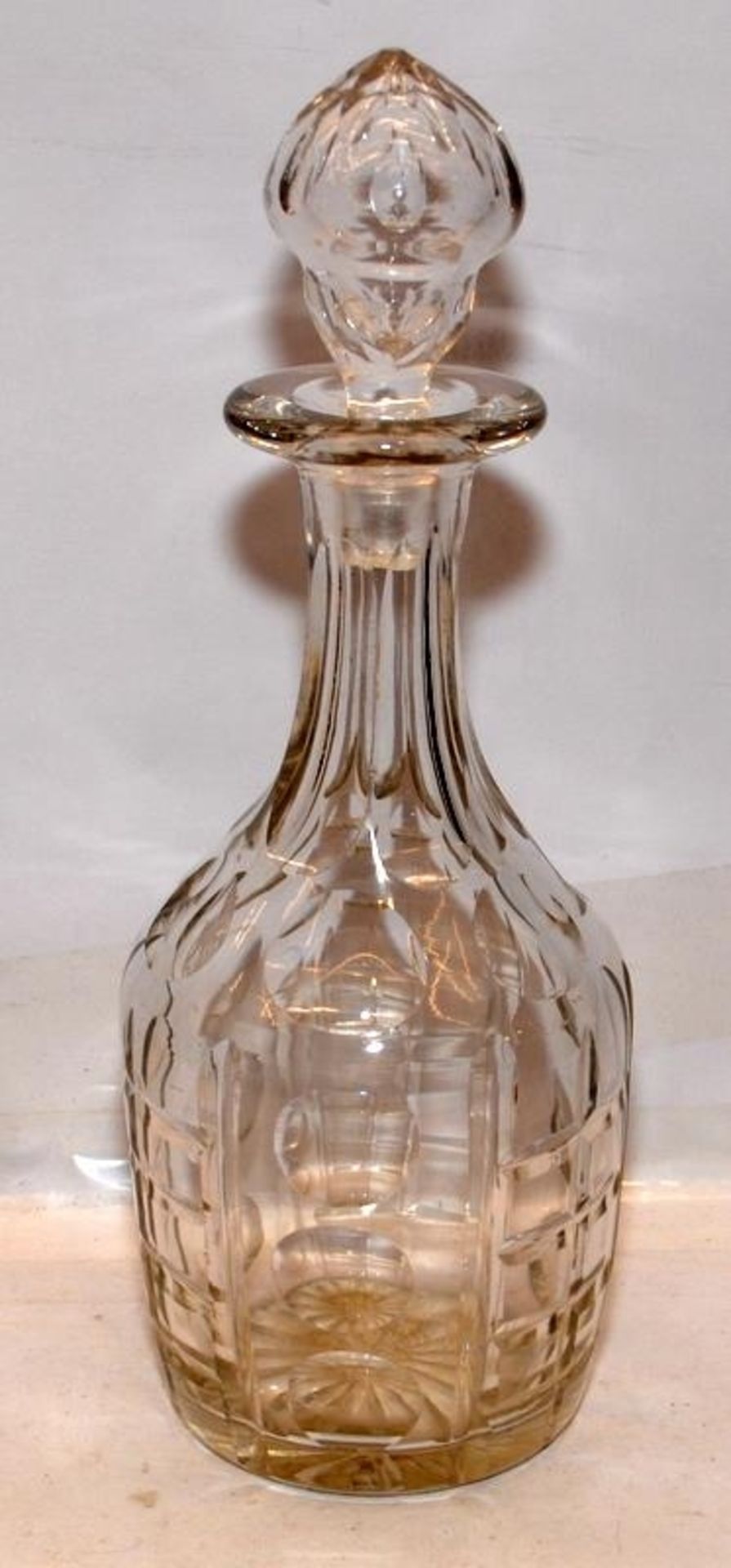 Vintage glass decanter with stopper. 33cms tall. On behalf of Forest Holme charity.