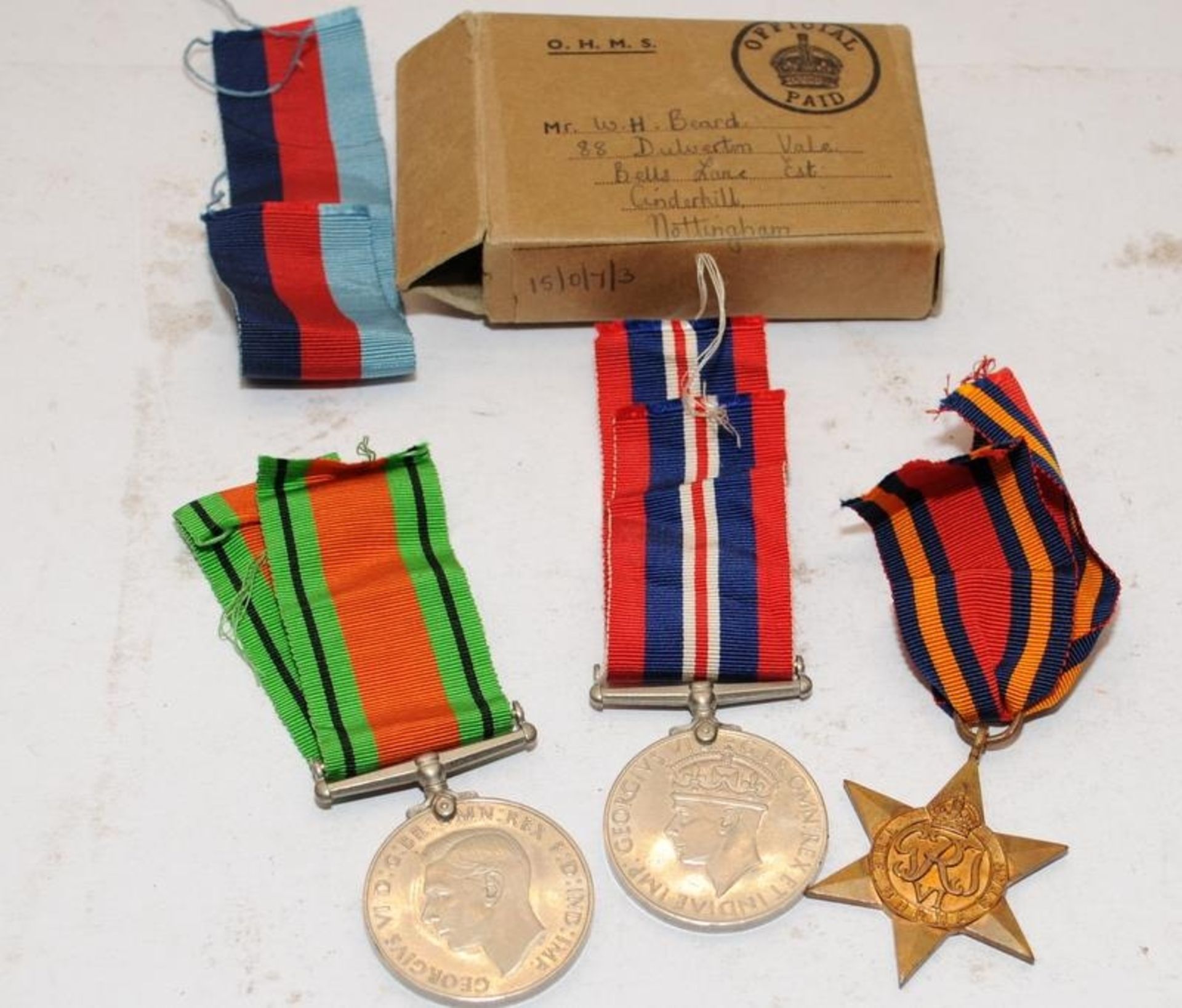 WW2 War Medal, Defence Medal and Burma Star c/w an OHMS dispatch box