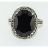 An onyx and marcasite 925 silver cocktail ring Size S