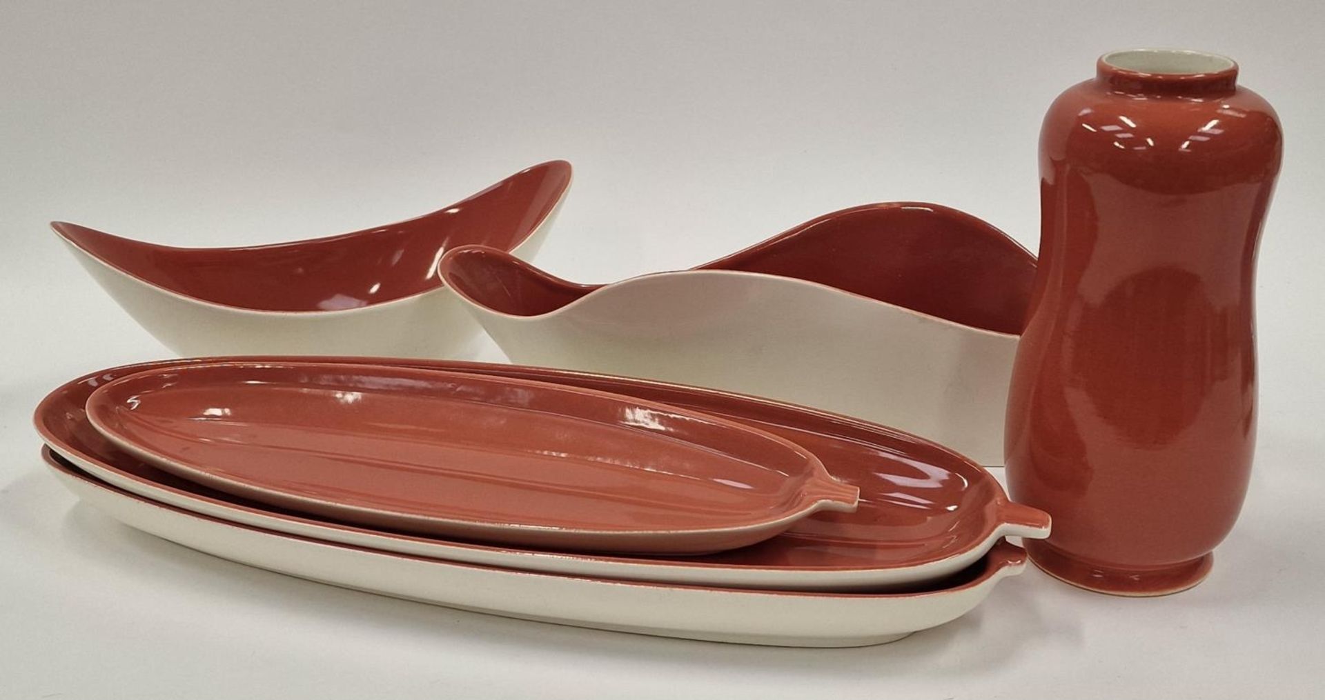 Poole Pottery Twintone collection in the rarer "Red Indian" colourway to include 699 peanut vase and