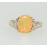 Yellow large opal/Diamond 9ct gold ring Size S