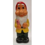 Painted ceramic garden gnome wearing a yellow jacket 46cm tall.