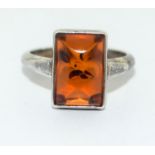 A rectangular set amber 925 silver ring Size M