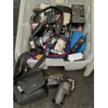 Collection of various compact digital cameras and accessories.