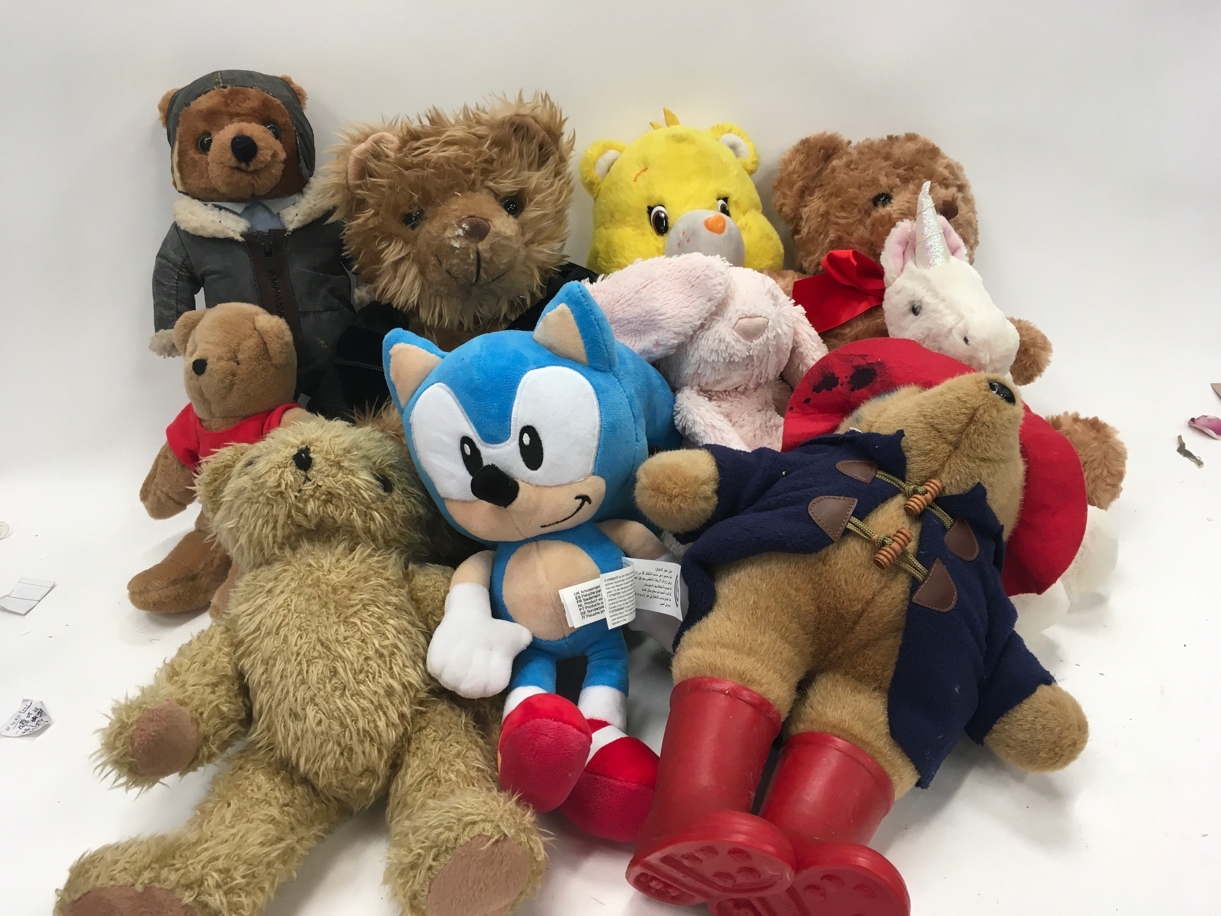 Mixed soft toys and teddies to include care bear and Giorgio Beverly Hill bear