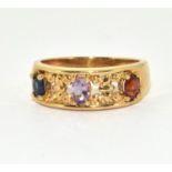 9ct gold ladies 3 stone ring Amethyst, Sapphire, and Garnet size L