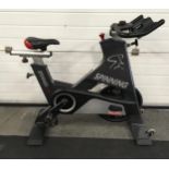 Professional Star Trac spinning bike as used in all sports clubs with fully adjustable riding