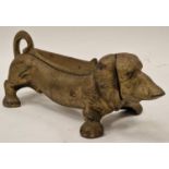 Vintage metal boot scraper in the form of Dachshund dog