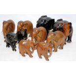 Quantity of carved wooden elephants, 5 pairs in lot, tallest being 17cms