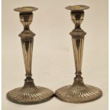 Pair silver plate candle sticks with an oval fluted base 25cm tall