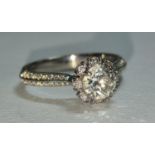 Diamond centre stone approx 0.75 points mount and shoulders also diamond set in 18ct white gold ring