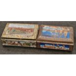 Pair of vintage German decorative storage tins.