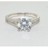 A sparkling 925 silver and CZ solitaire ring Size P.