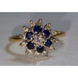 Diamond/Sapphire 18ct gold daisy ring, 3.4 g Size P