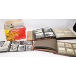 A large quantity of vintage b&w photographs. Good lot to sort through. 3 albums and a box