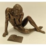 Contemporary bronzed unsigned nude of a gentleman reading a book 30cm tall.