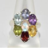 A multi gemset silver dress ring, Size N