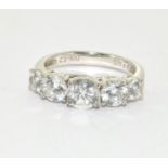 A W/G on silver five stone CZ ring Size O