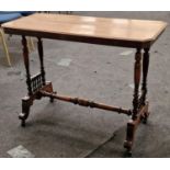 Edwardian mahogany hall table on turned supports and porcelain castors 65x90x45cm