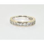 An 18ct white gold and diamond half eternity ring, Size L, 4gm