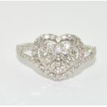 An 18ct gold diamond heart ring Size M 1/2, approx 1ct.