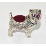 A Silver Dog Pincushion with Emerald Collar