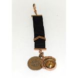 Gold pocket watch hanging strap set with a gold compass fob and a Arabic coin