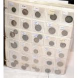 Folder containing a large quantity of World coins. Alphabetically presented from Switzerland through