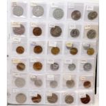 Folder containing a large quantity of World coins. Alphabetically presented from Indonesia through