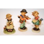 Large Goebel Hummel figures, Little fiddler, Busy Student and Bashful. 3 in lot