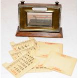 A collection of vintage desk accoutrements to include two perpetual calendars in chrome and oak, a