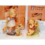 Two Goebel Hummel figures 'Sunflower Friends' and 'Will It sting'?. Both boxed with certificates.