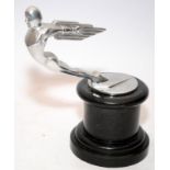 Art Deco Rocketeer Rocket Man car bonnet mascot mounted on ebonised plinth. O/all height 18cms