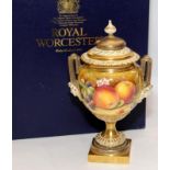 royal Worcester gilded fruit lidded pedestal vase with hand painted fruits decoration. Signed by
