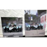 Two Formula 1 related contemporary canvas photographs the largest measuring 80x60cm.