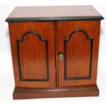 Antique oak cased smokers cabinet with fitted interior. 32cms x 34cms x 21cms