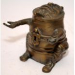 Novelty vintage brass pen holder and inkwell in grotesque form. 9cms tall