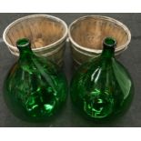 Two Vintage hand blown carboys in original baskets, excellent condition.