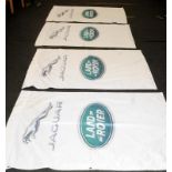 Four Jaguar Land Rover double sided advertising flags each measuring 140x90cm.