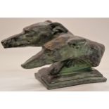 Bronzed patinated sculpture in the form of two greyhounds 29cm tall.